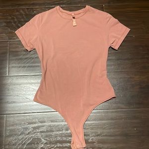 Skims- Fits everybody body suit